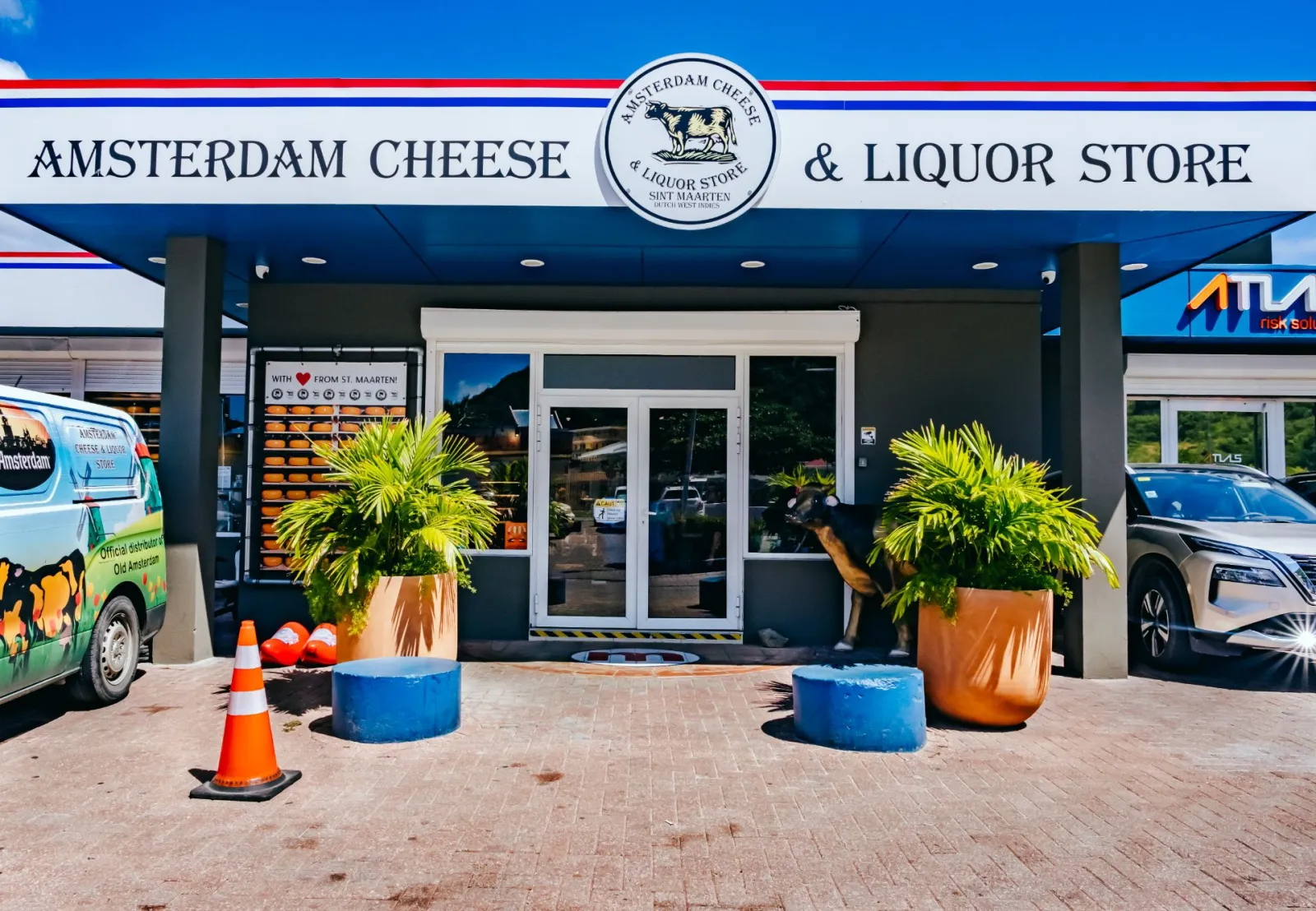 international liquor and tobacco st maarten Topper's Rhum Distillery with Unlimited Rum in 2026 Princess Juliana Airport in St