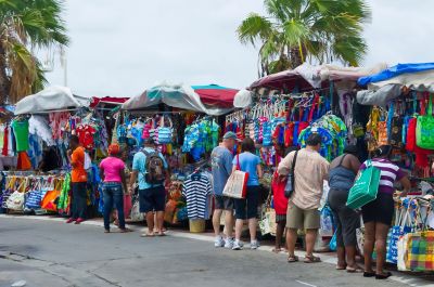 People shopping in the open market in Marigot
