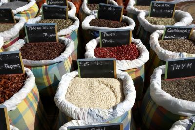 Cooking spices for sale on a market stall in Marigot
